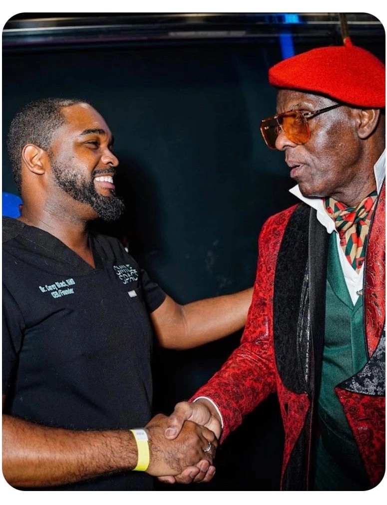 Dr. Black with Dapper Dan, a Harlem Legend